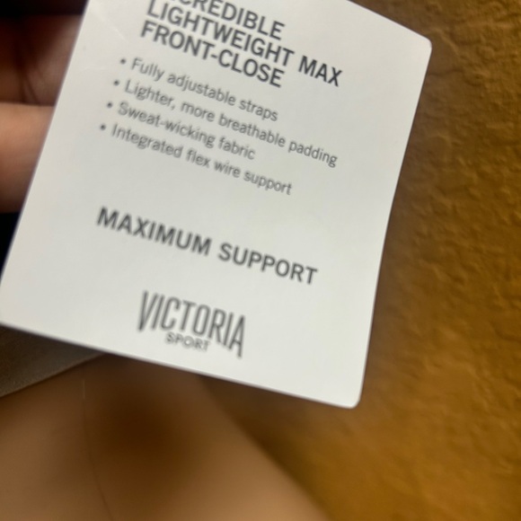 Victoria Black Zip-Front Sports Bra - Picture 2 of 7